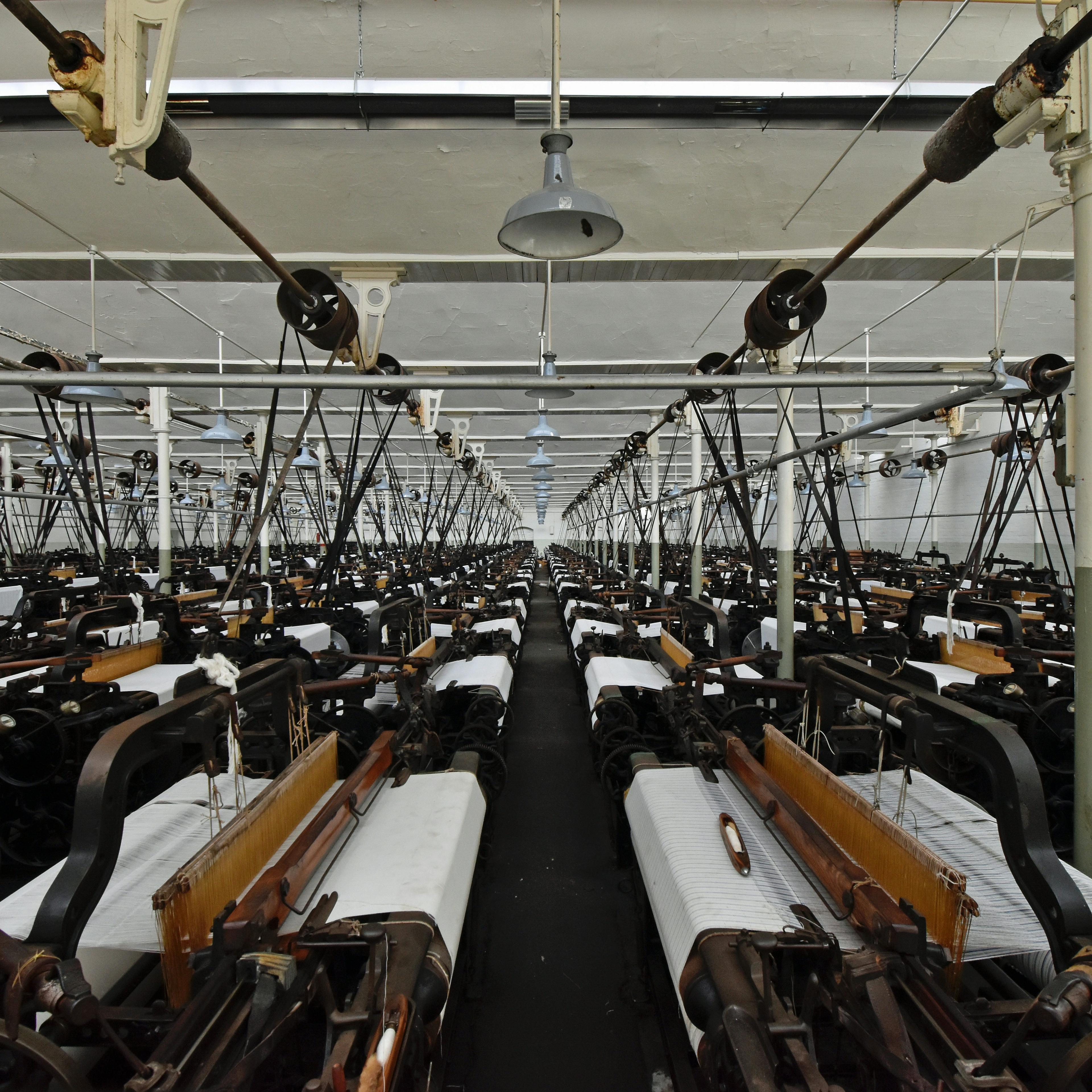 Industrial sewing machines in factory