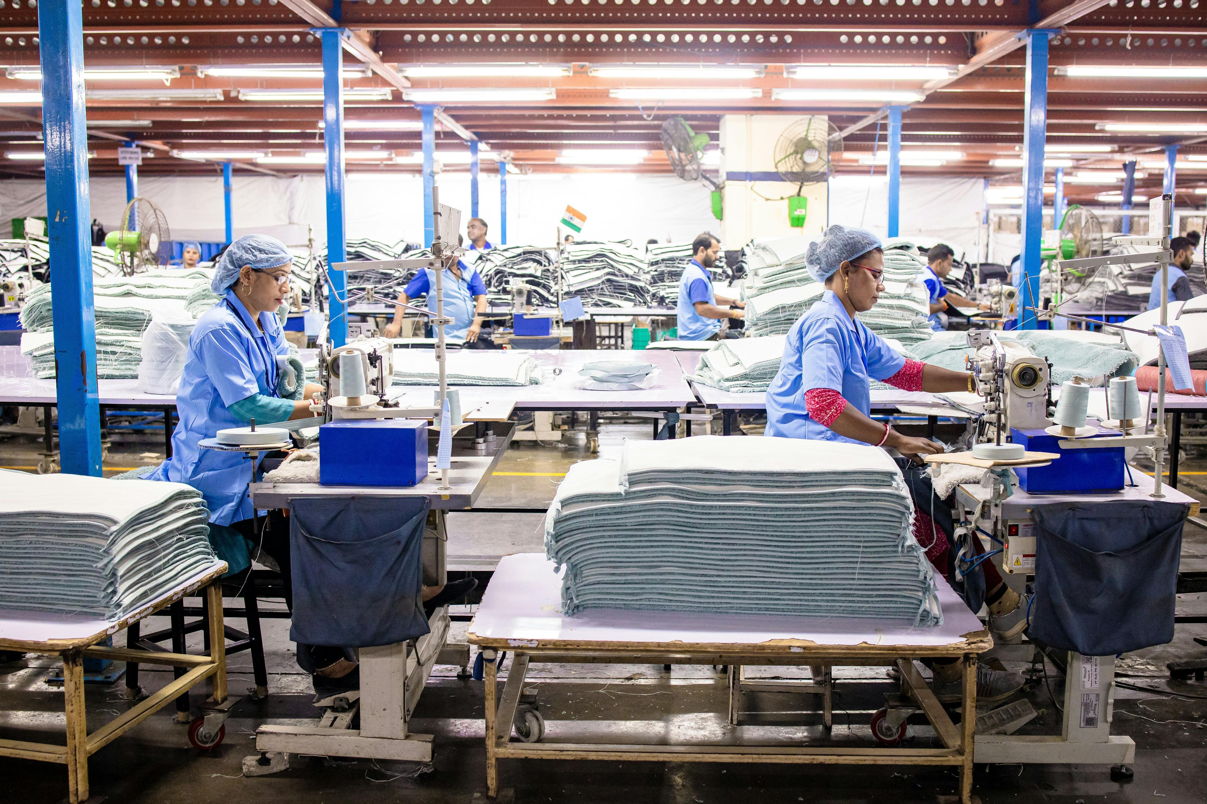 Factory workers at production line